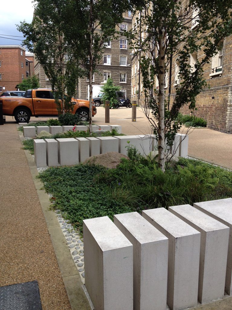 Rain garden with stone filters